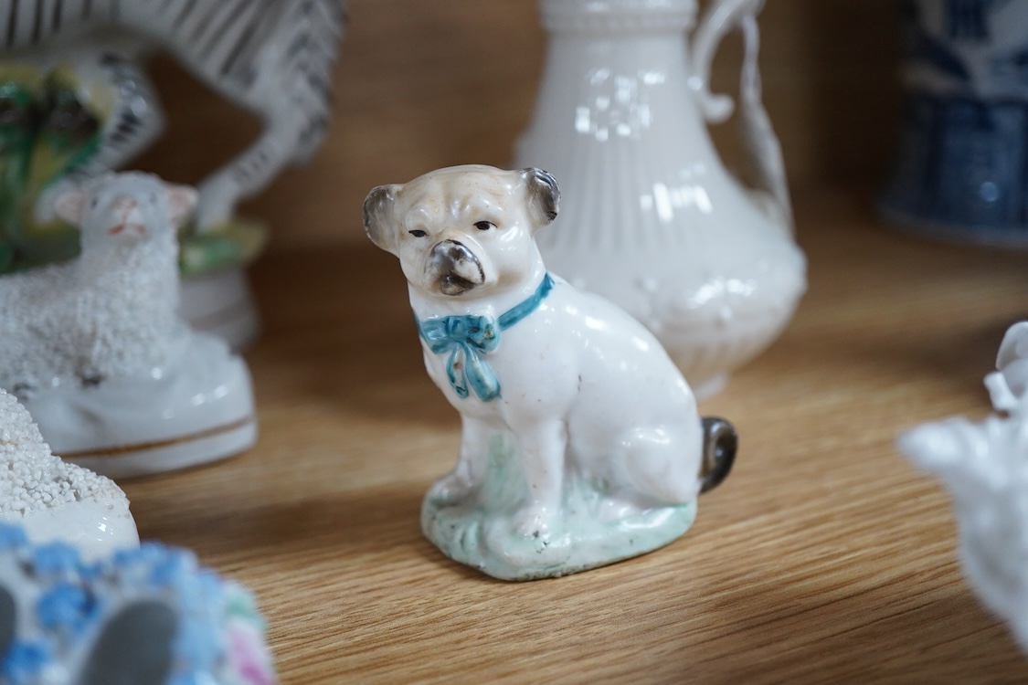 A pair of Worcester 'owl' candle snuffers, Staffordshire Zebra and two sheep, Belleek etc zebra 19cm wide.